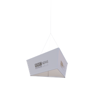 A white book is suspended mid-air by strings against a plain background, simulating the effect of a flying kite. The book has text on it: 'GUIDE NEWS'.