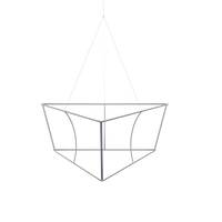 A hanging, geometric-shaped metal structure intended for display at a trade show or similar event.