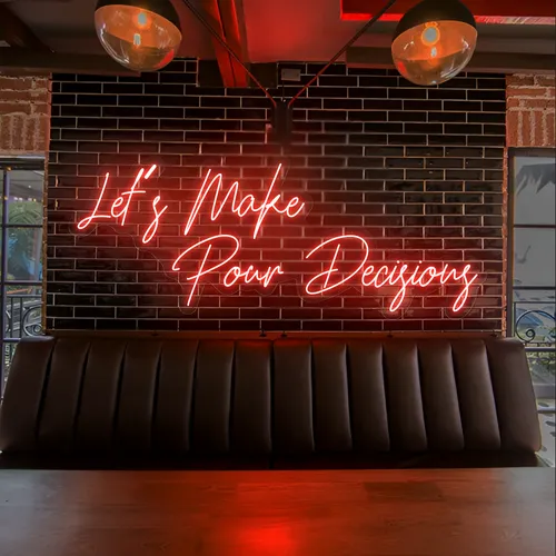 Eye-Catching "Let's Make Pour Decisions" Neon Sign